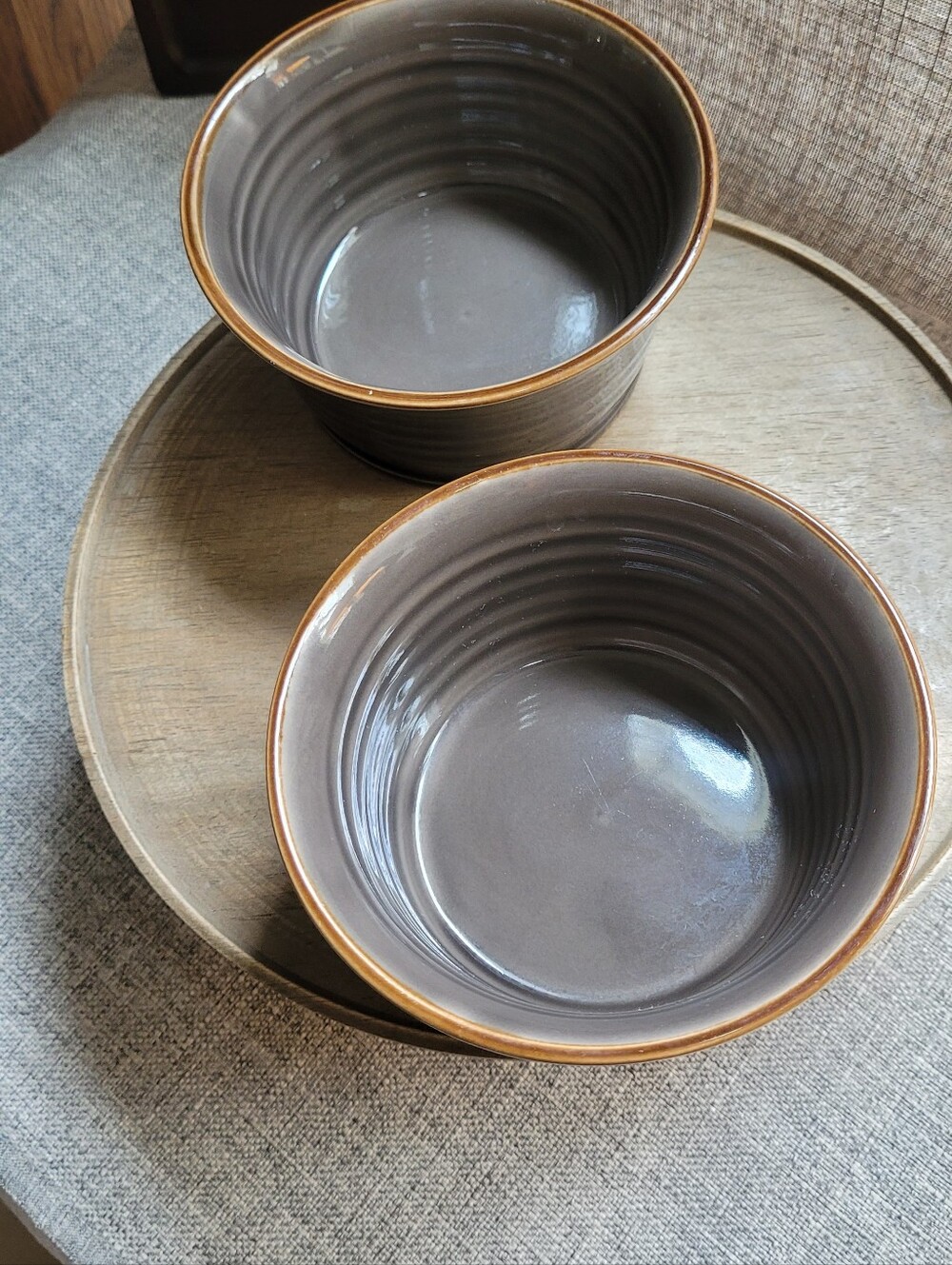 Set of Two Baum Brothers TUSCANY Stoneware Bowls in Warm Gray with Brown Rim.
